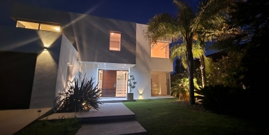 Modern house overlooking the golf course for sale and rental